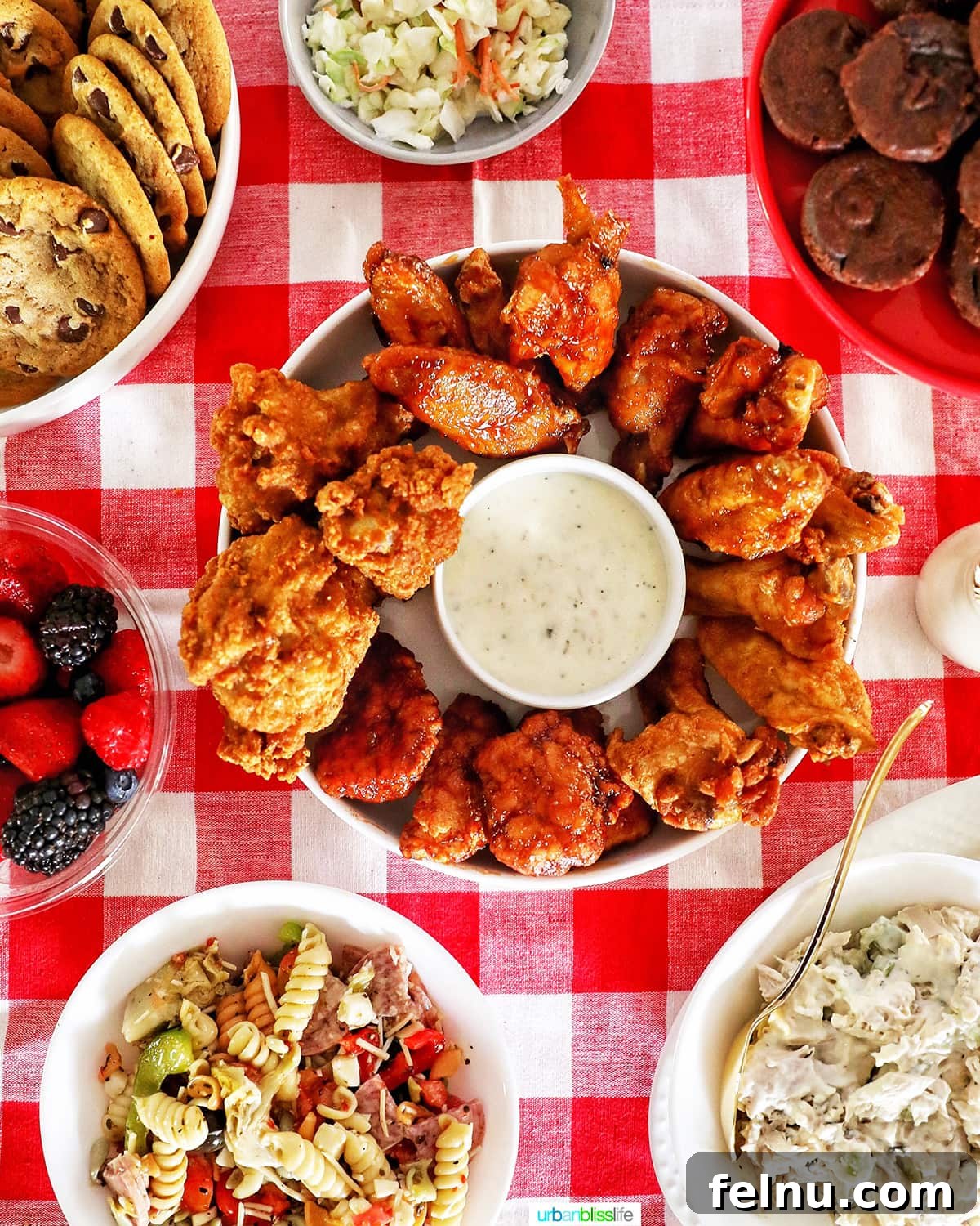 Ultimate Tailgate Grub Guide 2 A vibrant and delicious tailgating spread, featuring a variety of appetizers, snacks, and drinks, perfect for game day.