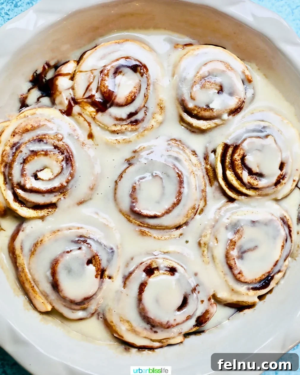 Overnight Orange Spice Rolls 13 A delightful full baking dish of iced orange cardamom cinnamon rolls, ready to be devoured.
