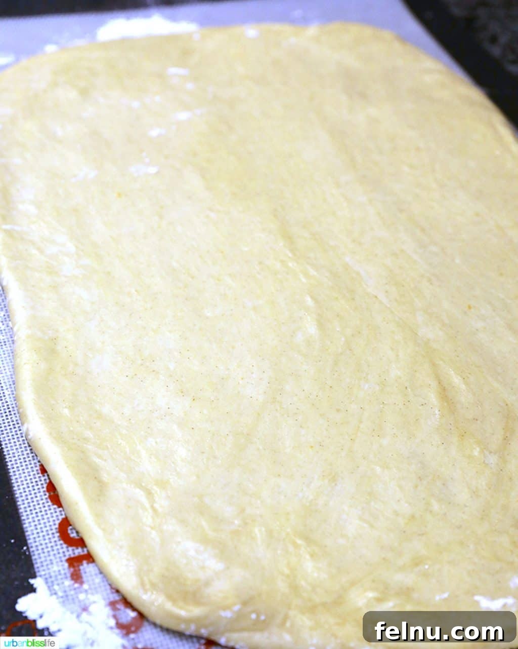 Overnight Orange Spice Rolls 8 Cinnamon roll dough, perfectly rolled out and ready for the filling.