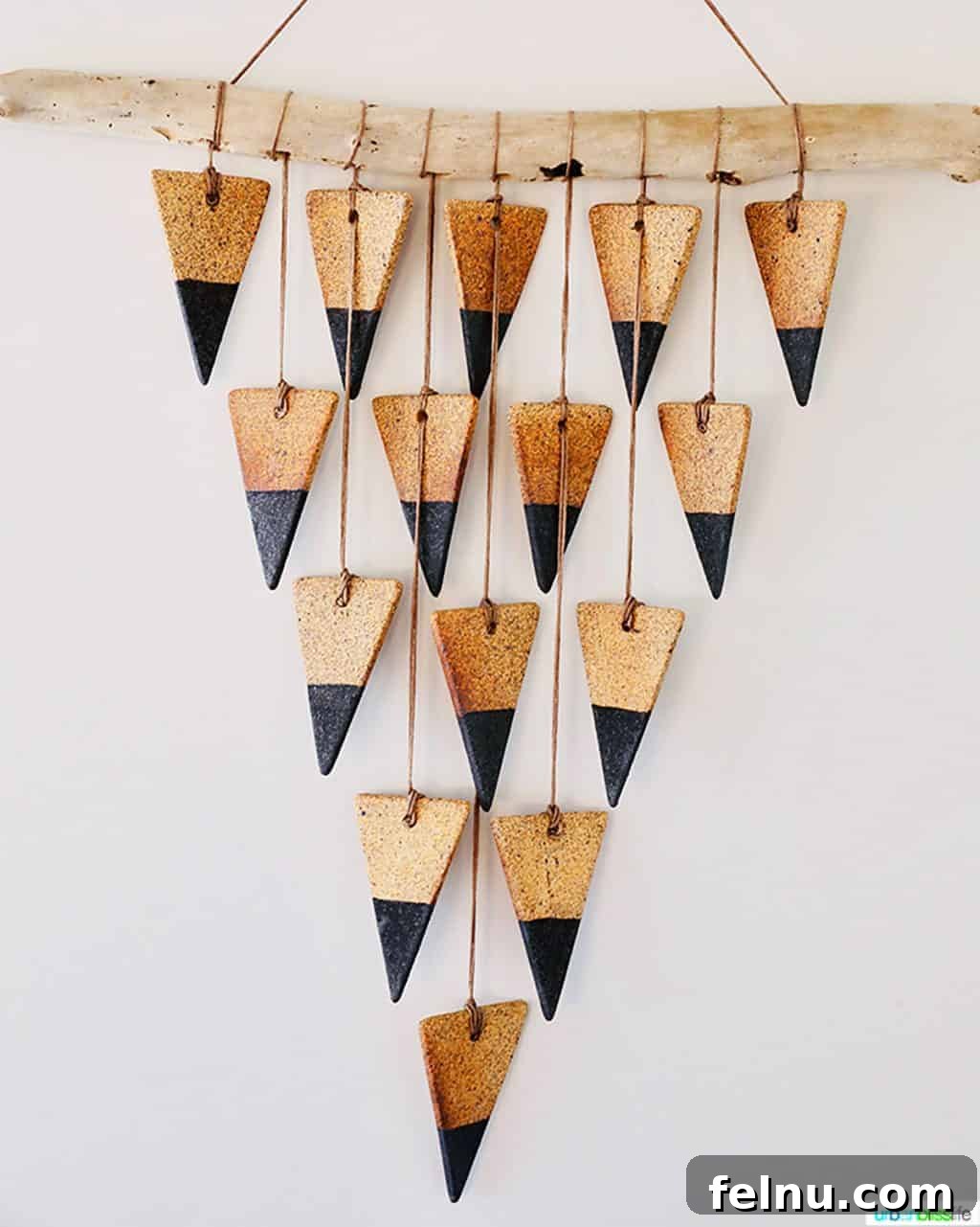 Glamping in Wine Country: Vintages Trailer Resort in Oregon's Willamette Valley 12 A striking triangular wall hanging adds a touch of modern artistry to the vintage interior of the Vintages Trailer Resort's mansion airstream.