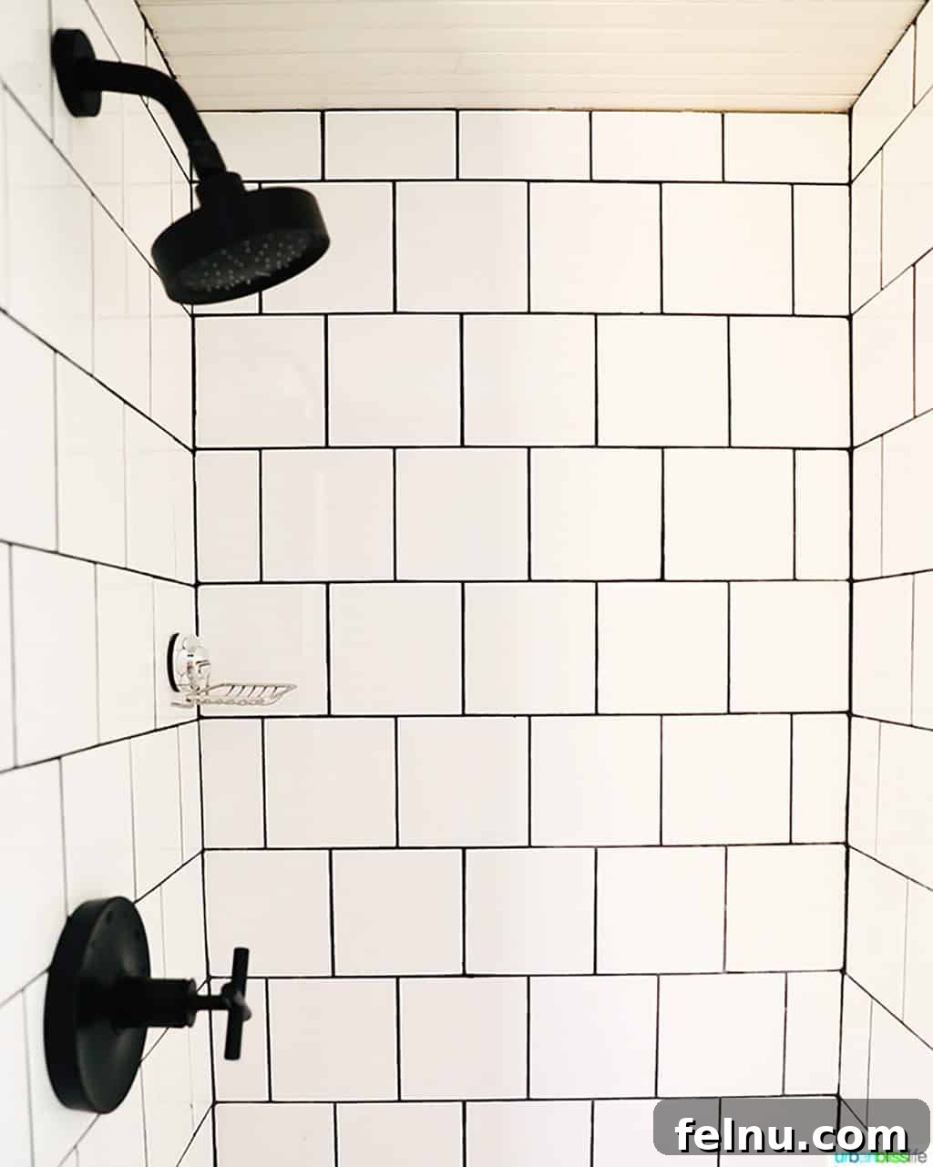 Glamping in Wine Country: Vintages Trailer Resort in Oregon's Willamette Valley 13 A pristine white subway tiled shower, showcasing the luxurious and modern bathroom facilities within the vintage airstream.