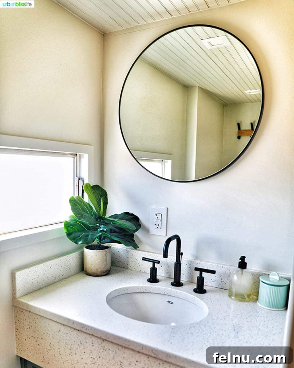 Glamping in Wine Country: Vintages Trailer Resort in Oregon's Willamette Valley 16 A contemporary bathroom vanity with a sleek sink and mirror, providing all the comforts of a modern hotel within the vintage trailer setting.