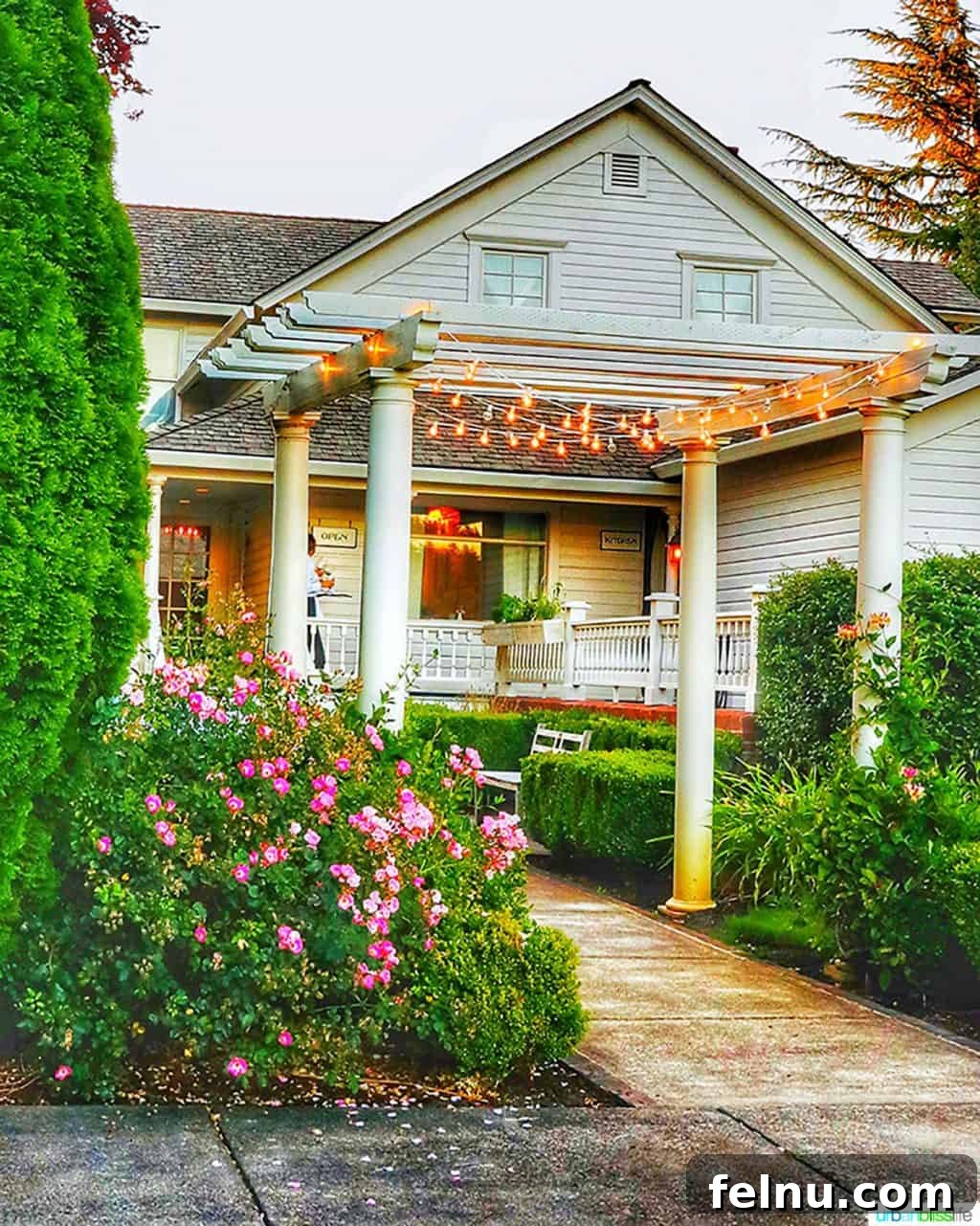 Glamping in Wine Country: Vintages Trailer Resort in Oregon's Willamette Valley 20 The charming entrance of Joel Palmer House, an iconic Oregon restaurant, illuminated by warm lights, inviting guests to a memorable dining experience.