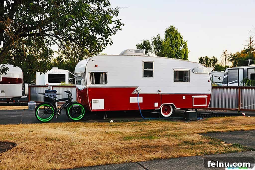 Glamping in Wine Country: Vintages Trailer Resort in Oregon's Willamette Valley 5 A vibrant red and white vintage trailer, impeccably restored, exemplifies the unique and colorful accommodations available at Vintages Trailer Resort.