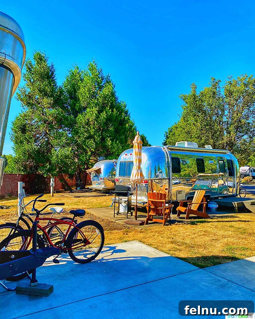 Glamping in Wine Country: Vintages Trailer Resort in Oregon's Willamette Valley 7 A row of colorful vintage trailers with cruiser bikes parked outside, illustrating the charming and active atmosphere at The Vintages Trailer Resort.