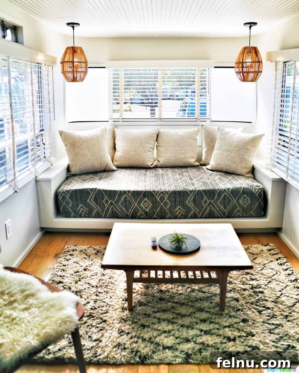 Glamping in Wine Country: Vintages Trailer Resort in Oregon's Willamette Valley 9 The inviting sitting area and living room inside the spacious 1956 Royal Spartan Mansion airstream at Vintages Trailer Resort, adorned with stylish decor.