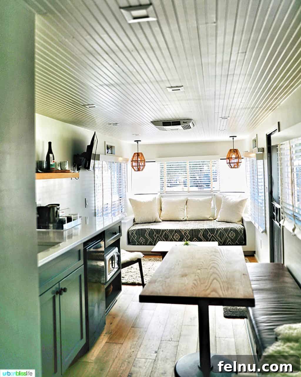 Glamping in Wine Country: Vintages Trailer Resort in Oregon's Willamette Valley 10 A beautifully designed sitting area and kitchenette in the 1956 Royal Spartan Mansion airstream, highlighting efficient and stylish use of space.