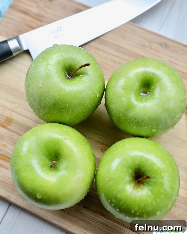 Homemade Freezer Apple Pie Filling 4 Pile of crisp Granny Smith green apples, perfect for baking pies