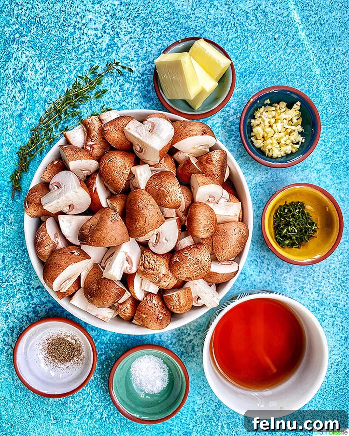 Savory Marsala Mushrooms 5 All the ingredients for mushroom marsala laid out in individual bowls, ready for cooking