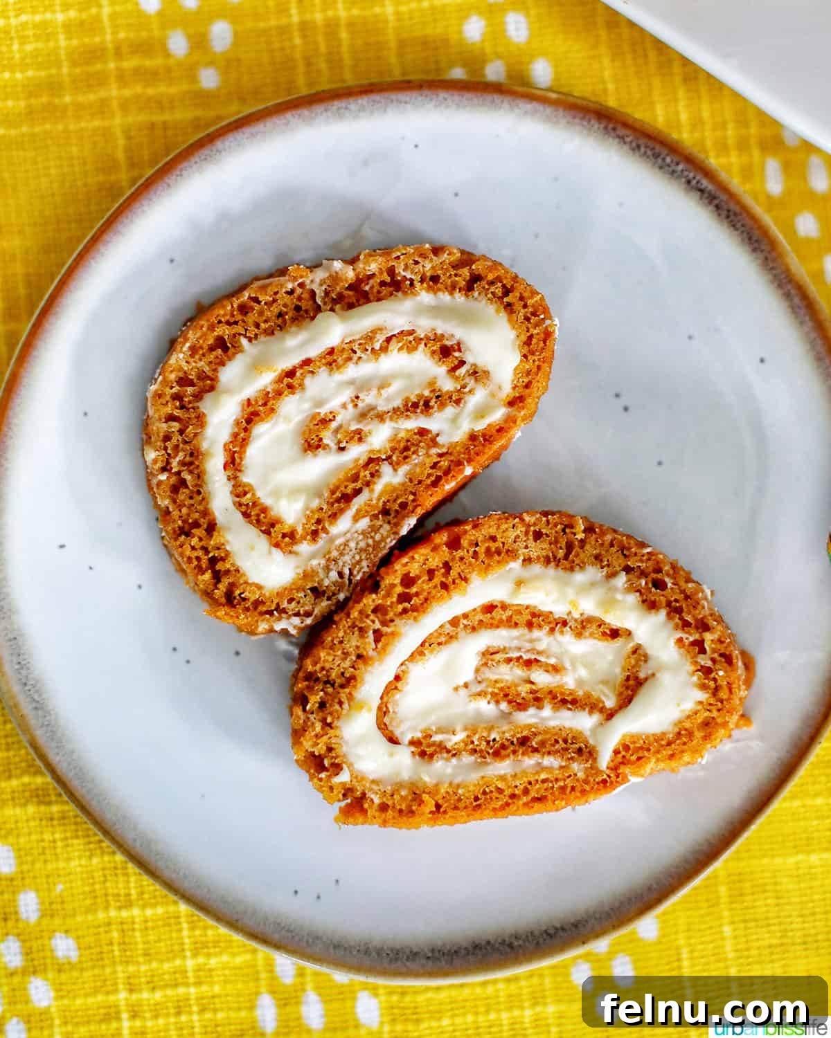 Pumpkin Cream Cheese Swirl Log 3 Pumpkin Cream Cheese Roll on a Plate