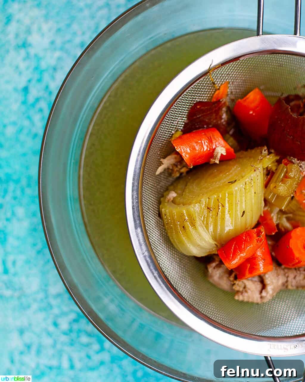 Vegetable scraps in a strainer