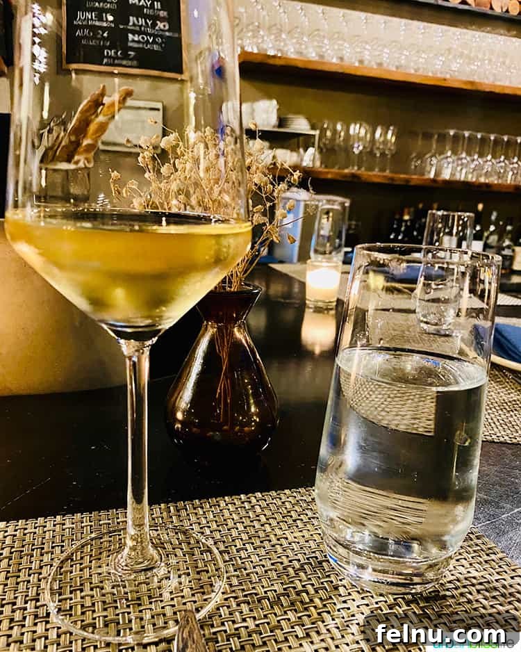 Portland's Top Romantic Dinner Spots 14 Elegant glass of white wine and water at Arden restaurant in Portland, Oregon.
