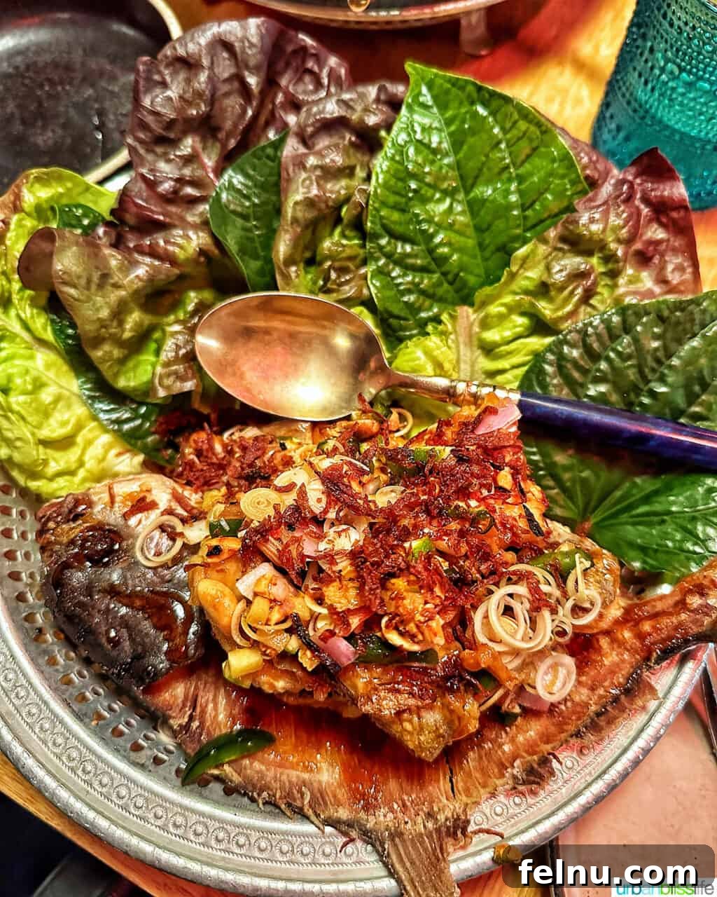 Portland's Top Romantic Dinner Spots 38 Crispy whole fried fish served with fresh salad leaves at Phuket Cafe.