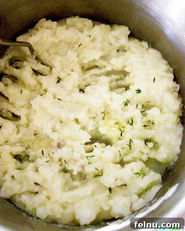 Effortless Comfort: Meatloaf & Creamy Mash 3 Bowl of freshly made mashed potatoes
