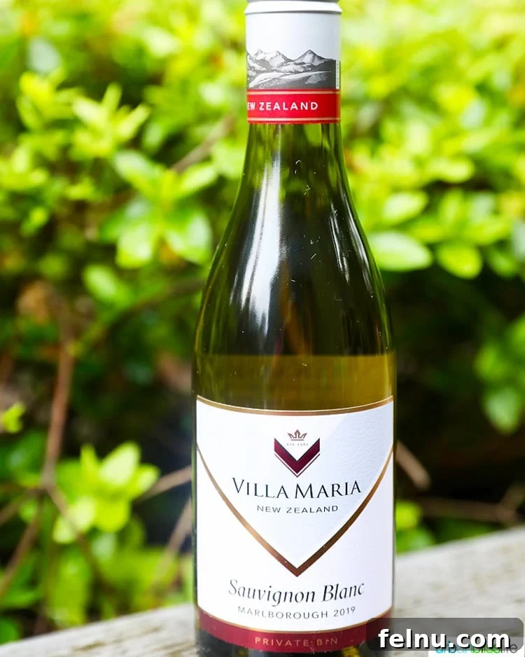Sizzling Sheet Pan Chicken Fajitas 12 A bottle of Villa Maria Sauvignon Blanc 2019 wine, a refreshing and zesty choice to complement the flavors of chicken fajitas.
