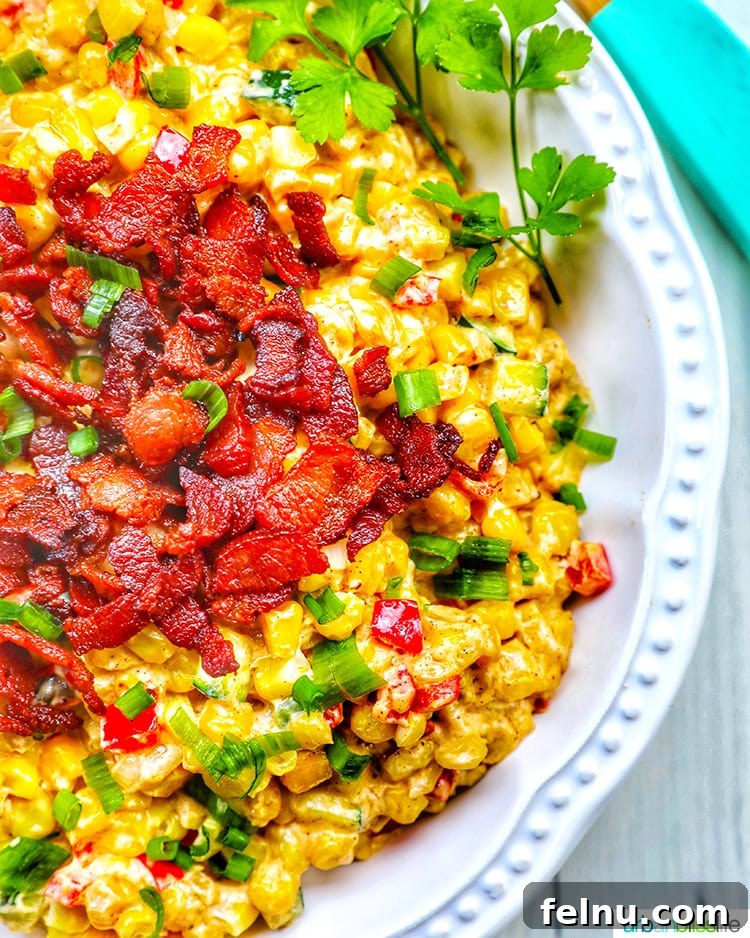 Sizzling Sheet Pan Chicken Fajitas 10 A vibrant and colorful creamy confetti corn side dish, a perfect complement to the flavors of the fajitas.