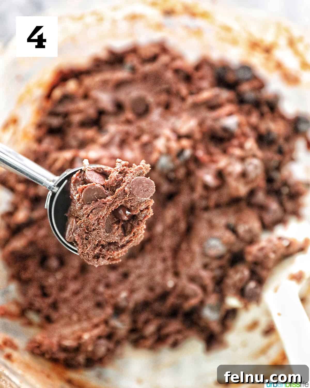 Chocolate Cake Mix Cookies 8 Cookie scoop filled with chocolate cookie mix batter.