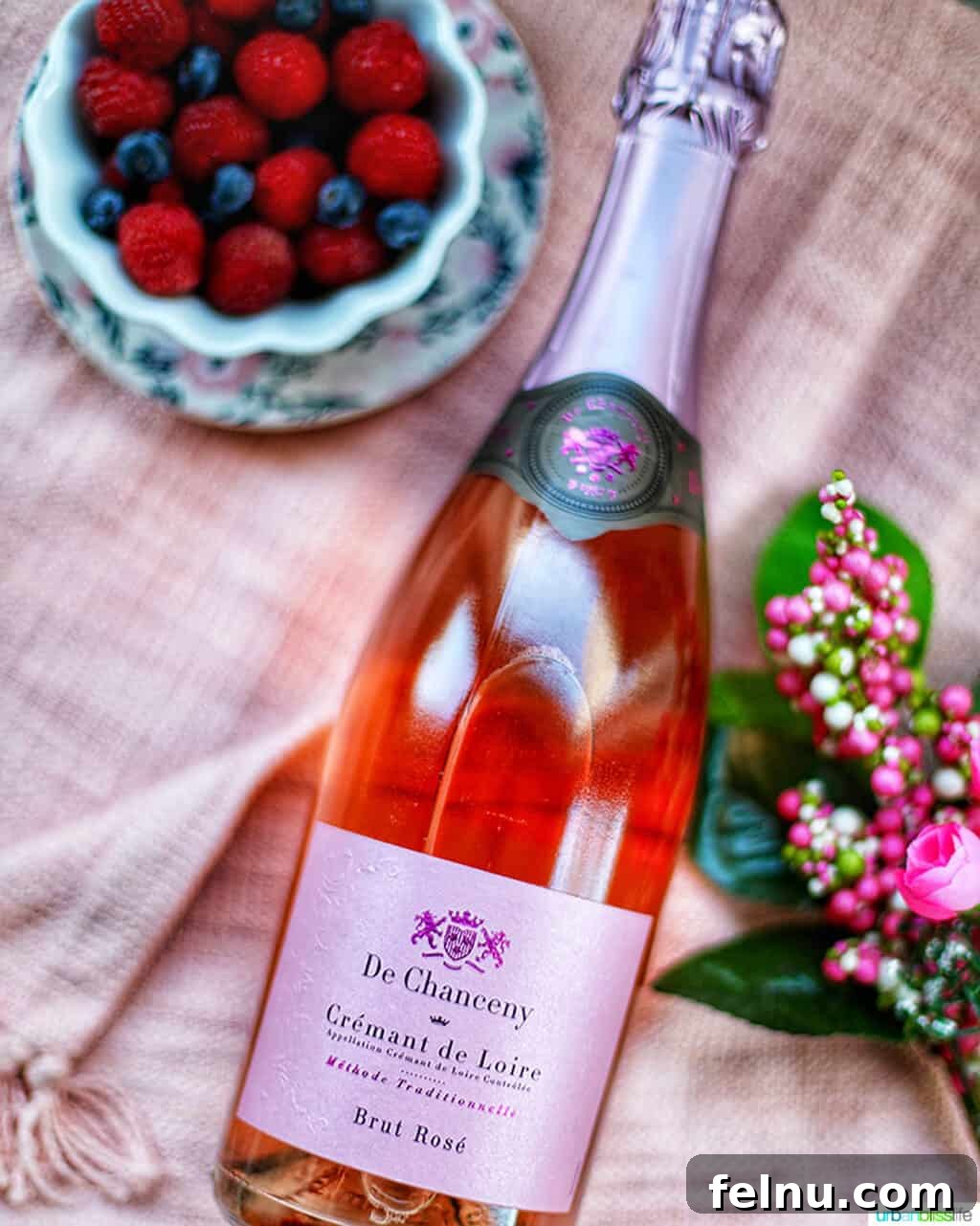 Perfect Wines for Valentines Day 6 De Chanceney Cremant de Loire bottle with flowers and bowl of fruit