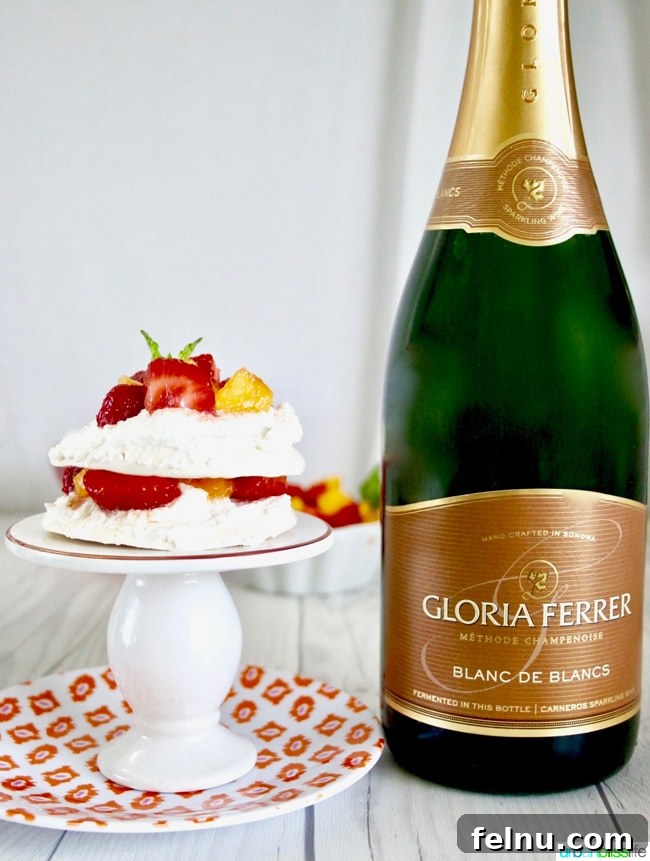Perfect Wines for Valentines Day 7 Mini Pavlova Cakes with Strawberries, Peaches, and Cream recipe on UrbanBlissLife.com