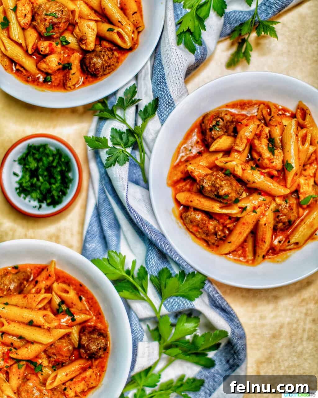 Cajun Chicken Pasta in a Flash 2 Bowls of delicious Instant Pot Cajun Chicken Pasta garnished with fresh herbs