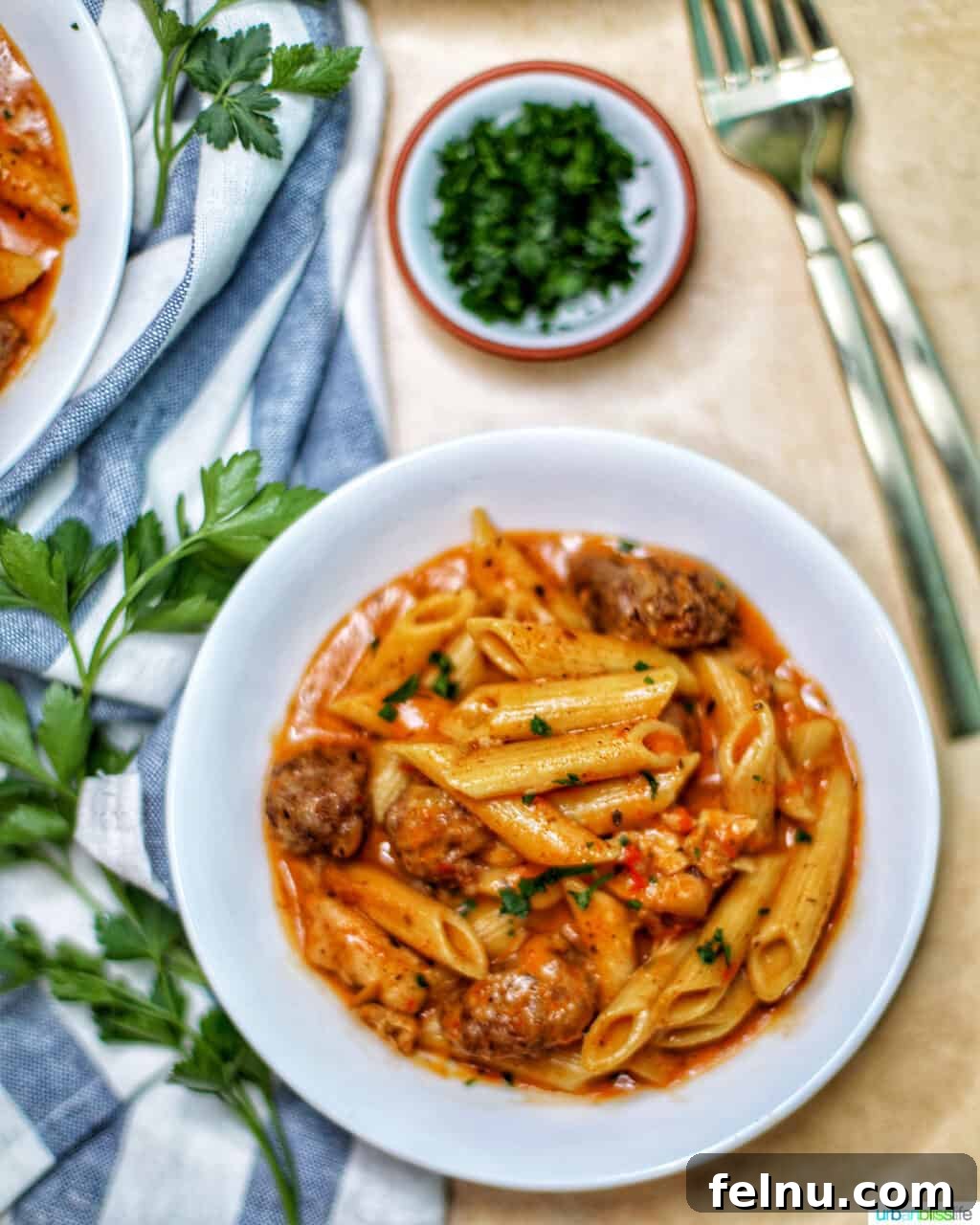 Cajun Chicken Pasta in a Flash 17 Another close-up view of Instant Pot Cajun Chicken Pasta with forks