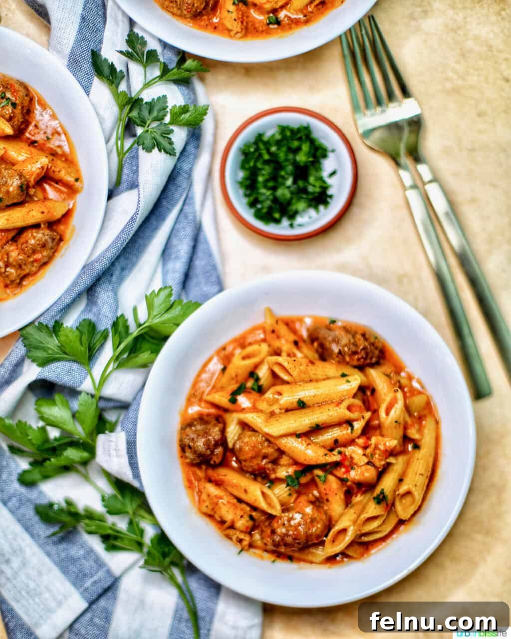 Cajun Chicken Pasta in a Flash 4 Close-up of Instant Pot Cajun Chicken Pasta in bowls with forks