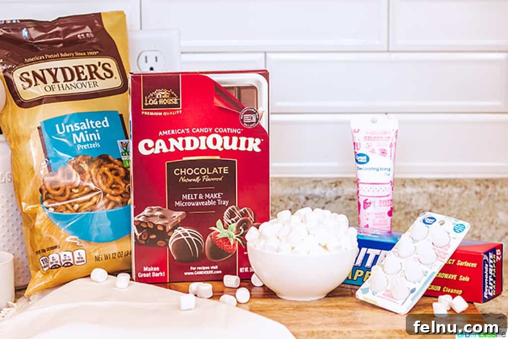 Whip Up Adorable Easter Bunny Pretzels 4 A selection of ingredients laid out for making bunny pretzels, including mini pretzels, chocolate candy melts, mini marshmallows, and pink icing.