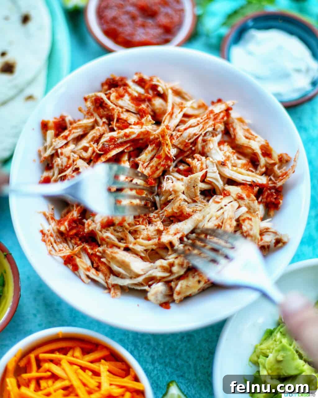 Easy Instant Pot Salsa Chicken 6 two forks shredding Instant Pot Salsa Chicken