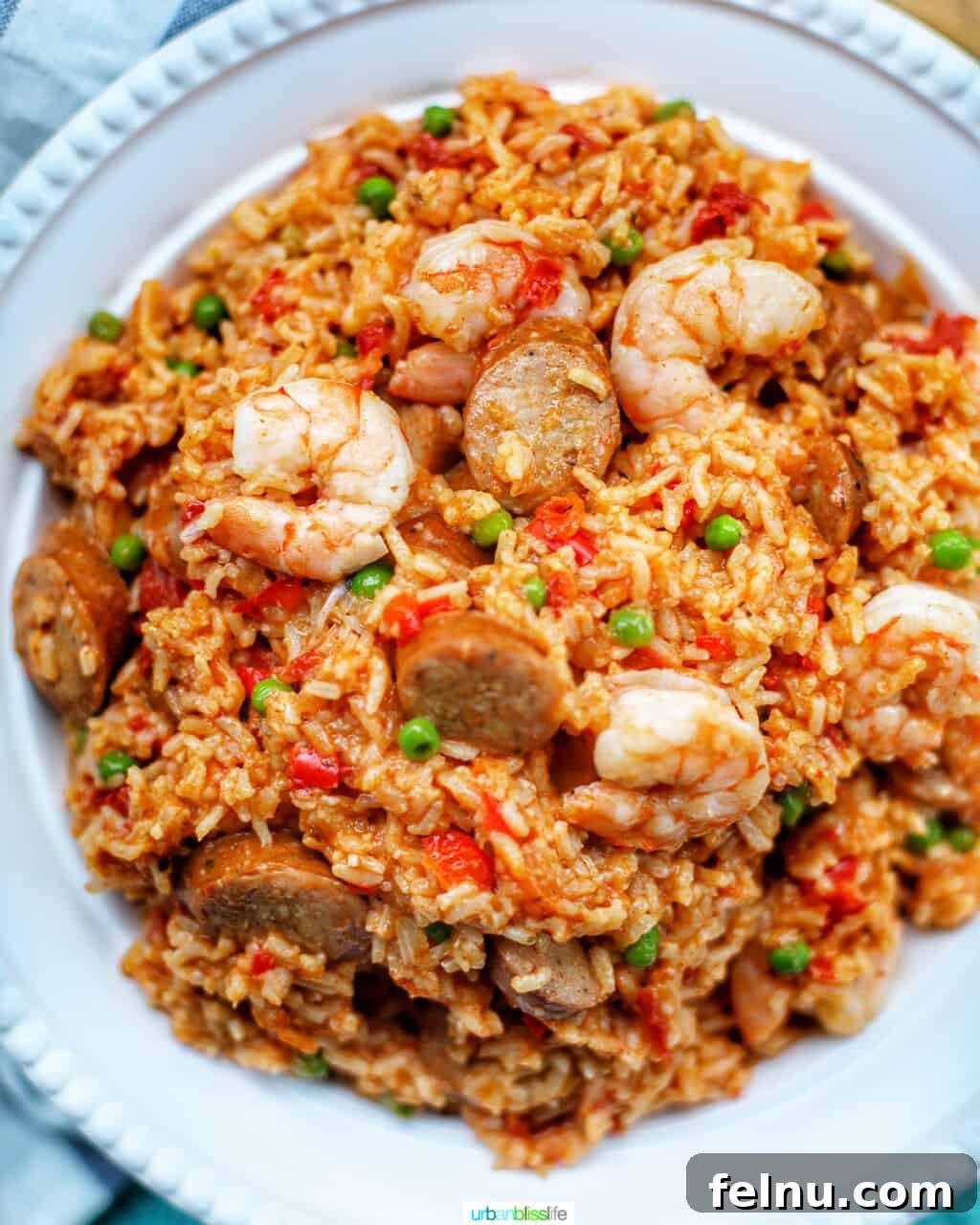 Mastering Ninja Foodi Pressure Cooker Meal Prep Cookbook 4 A hearty bowl of Ninja Foodi Seafood Jambalaya, packed with flavor and fresh ingredients.