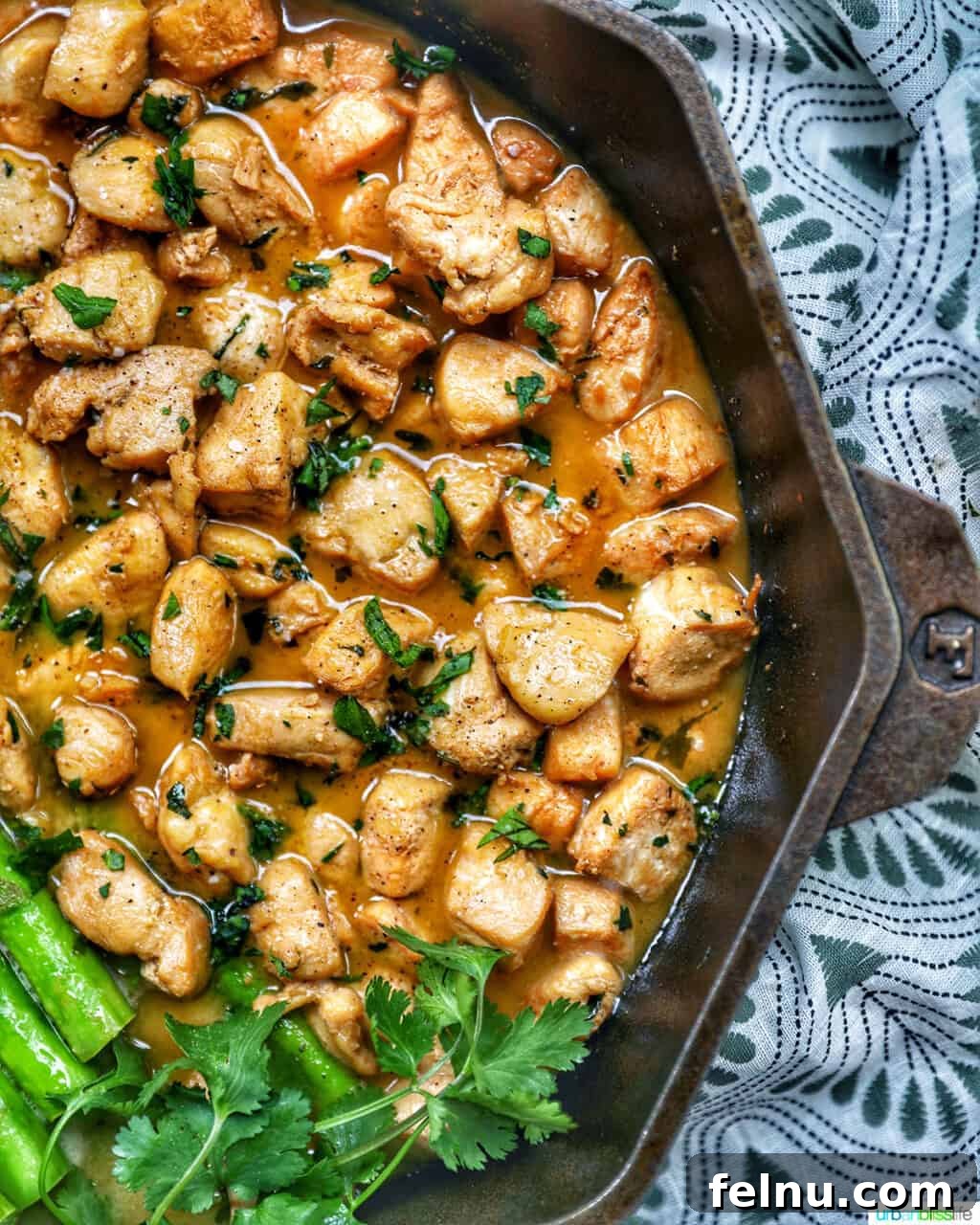 Golden Garlic Butter Chicken Morsels 4 Soy garlic butter chicken bites cooking in a cast iron pan