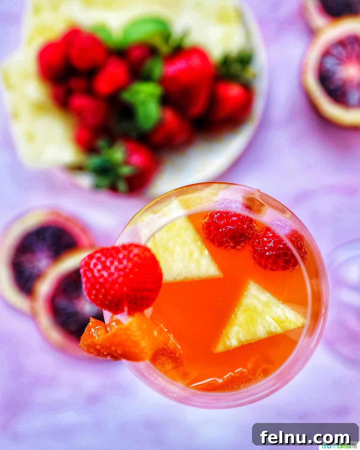 Tropical Sangria Bliss 3 Glass of tropical sangria with fruit slices