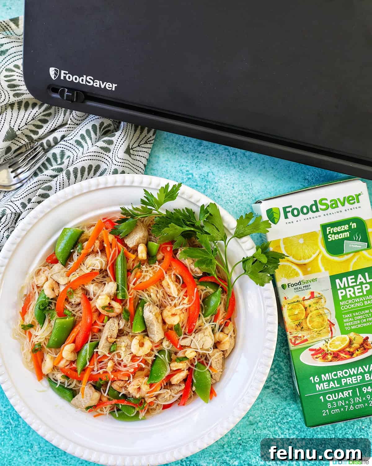 Filipino Pancit Bihon Delight 14 Filipino Pancit Bihon with FoodSaver machine and Meal Prep Bags for convenient storage.