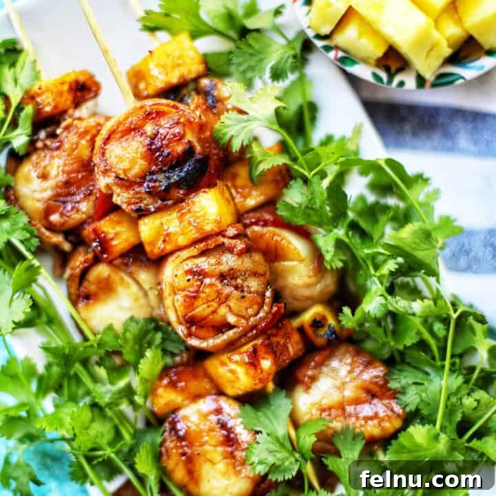 Bacon Bliss Teriyaki Scallops 6 grilled bacon wrapped scallops on bed of lettuce.