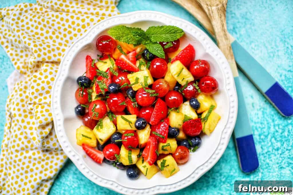 Simple fruit salad with salad tongs