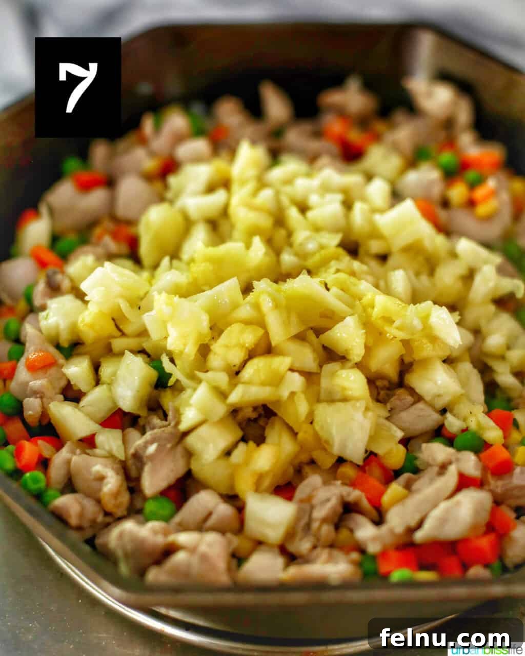Pineapple Paradise Chicken Fried Rice 12 pineapple mixing into fried rice