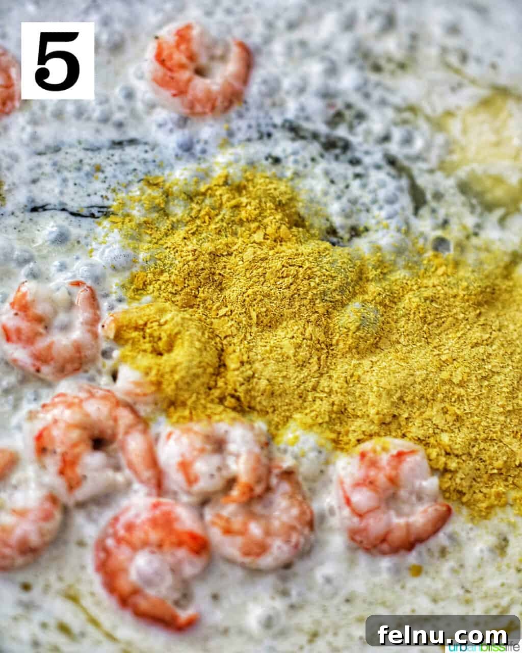 Savory Shrimp & Tortellini Dairy-Free Delight 9 adding nutritional yeast