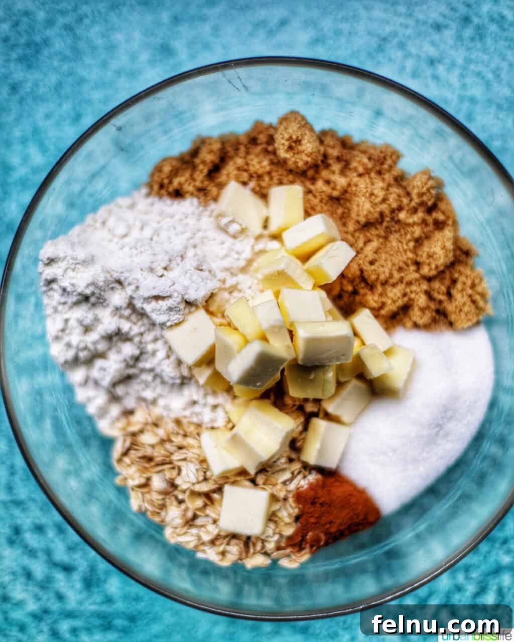 Autumn Spice Cheesecake Squares 16 Streusel topping ingredients mixed in a bowl.