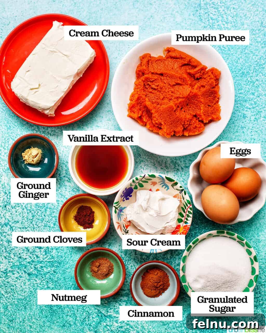 Autumn Spice Cheesecake Squares 6 Ingredients for the Pumpkin Cheesecake Filling: cream cheese, pumpkin puree, vanilla extract, eggs, spices, sugar, and sour cream.