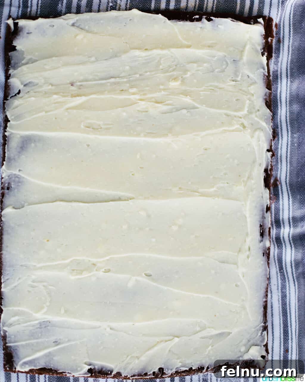 Gingerbread Swirl Cake 18 Cream cheese filling spread on the gingerbread sponge cake.