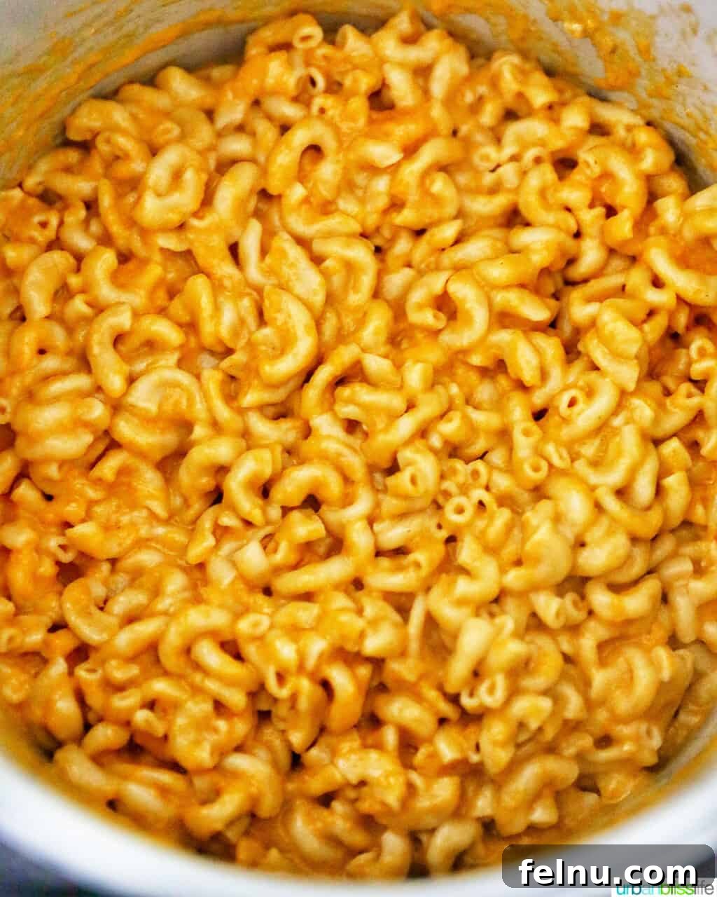 Savory Butternut Instant Pot Mac and Cheese 16 The finished creamy pressure cooker butternut squash mac and cheese, perfectly blended and ready to serve, shown in the Instant Pot.