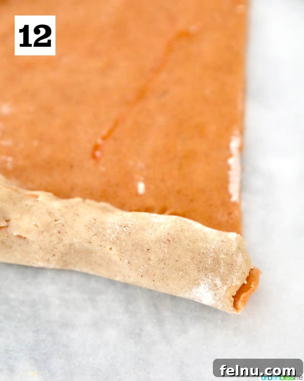 Rolling Orange Cookie Dough Up