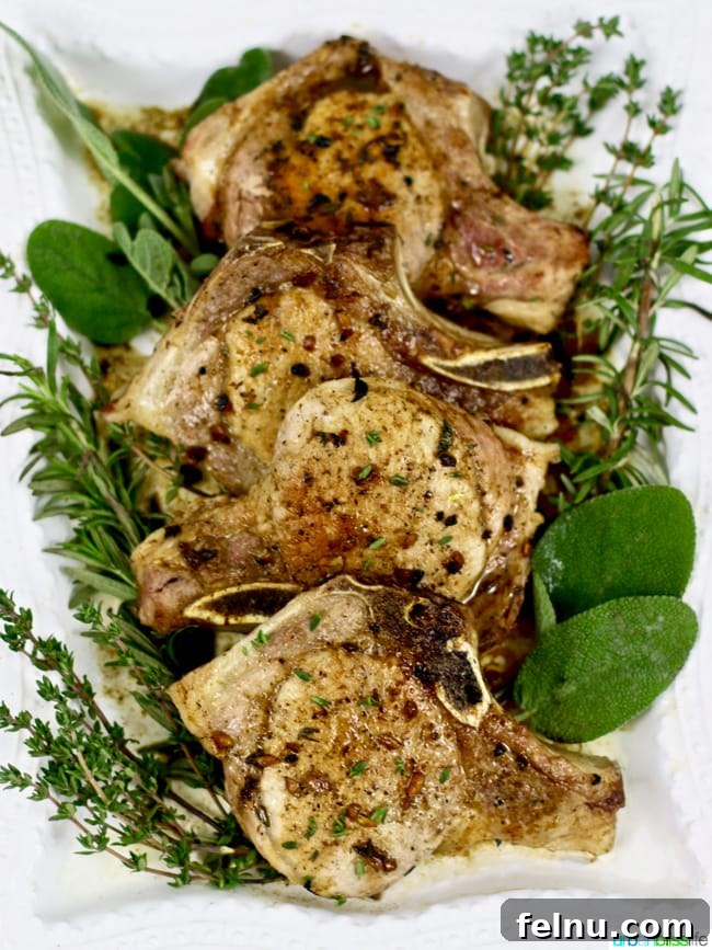Apple Cider Pork Chops with a glossy glaze.