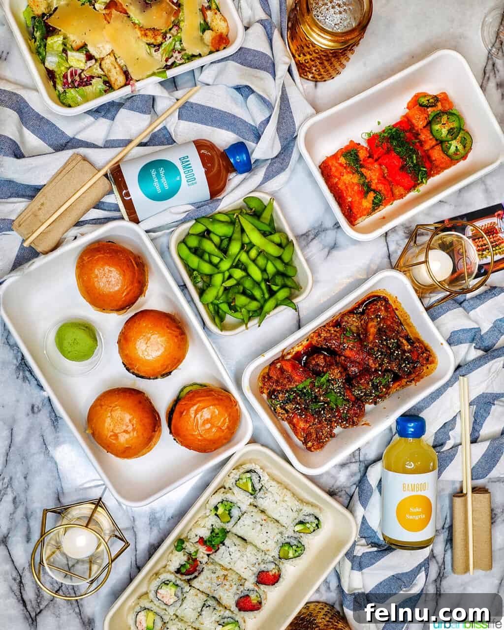 Table filled with Bamboo Sushi take-out