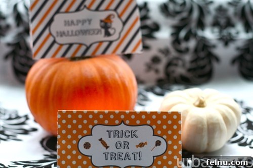 Halloween2012_favorbaglabels04 An inviting assortment of Halloween treat bags featuring diverse printable labels, arranged for a festive party setting