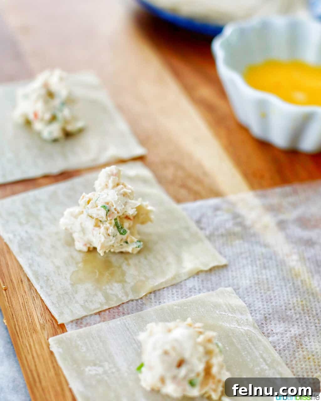 Perfectly Crispy Air Fryer Crab Rangoon 10 Assembling crab rangoon wontons, multiple fillings on wrappers