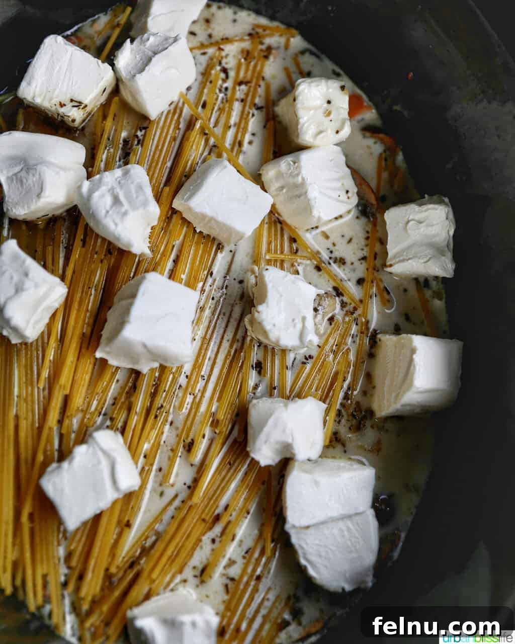 Slow-Cooker Turkey Tetrazzini Delight 14 Cream cheese added to the other ingredients