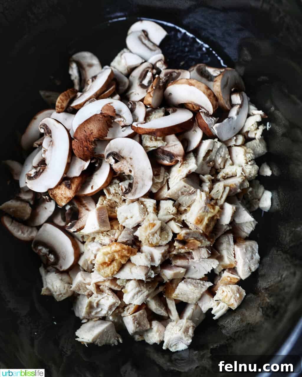 Slow-Cooker Turkey Tetrazzini Delight 6 Turkey and mushrooms in crockpot
