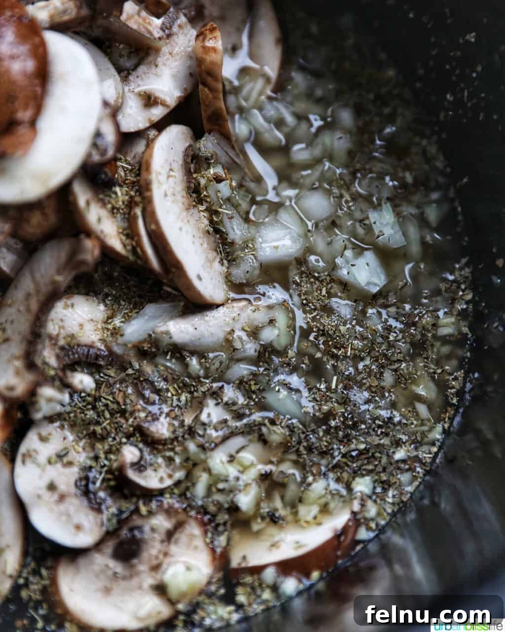 Slow-Cooker Turkey Tetrazzini Delight 9 Turkey, mushrooms, and chicken broth in crockpot