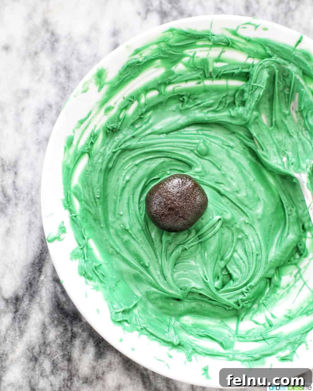 Mint Oreo Bliss Bites 20 Mint Oreo truffle in green chocolate.