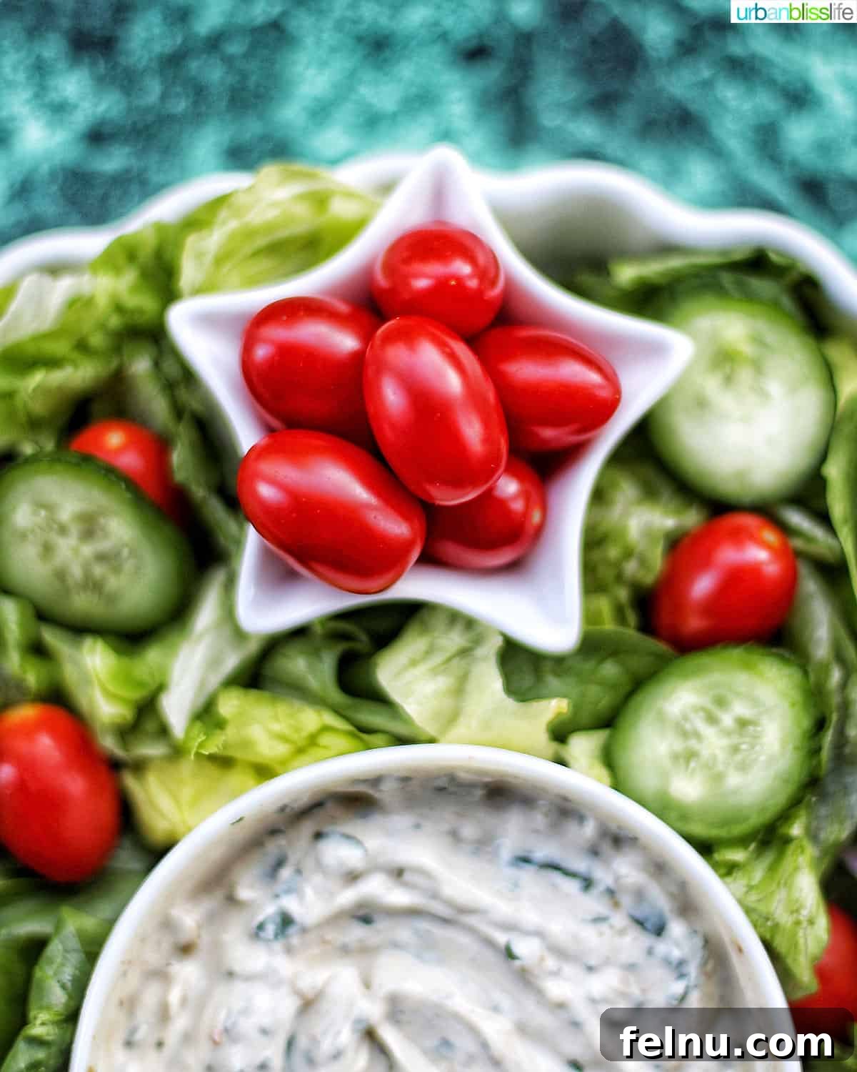 Dairy-Free Christmas Wreath Salad with Creamy Ranch 3 Close-up of tomatoes on Christmas Salad Wreath